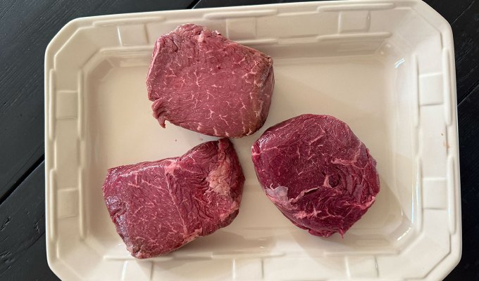 best steak delivery service: snake river farms steaks, raw on a platter