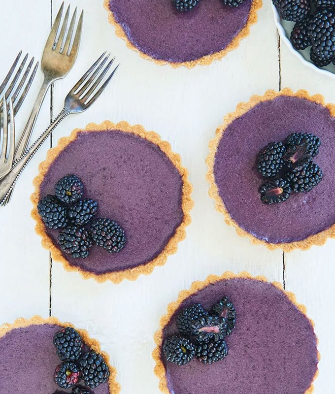 high-protein desserts: blackberry panna cotta tartlets