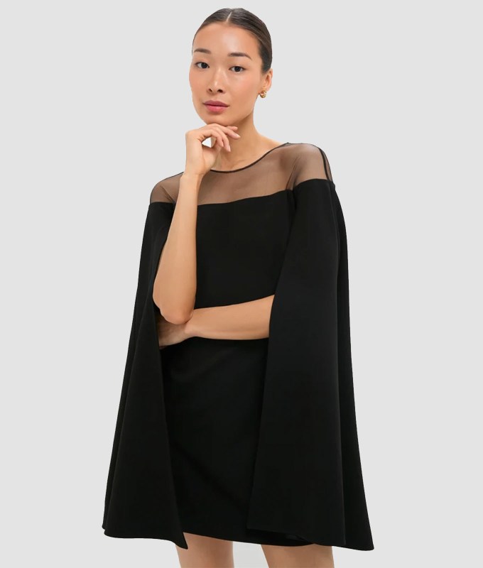 The Tuckernuck Black Estelle Cape Dress.