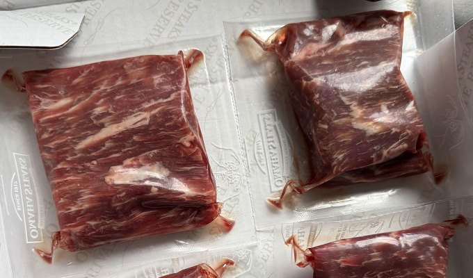 steak delivery service: omaha steaks raw in packaging